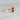 GEOMUSE RING in 18k gold with square cut ruby and small ruby stones.