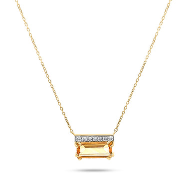 18k gold Geomuse necklace with baguette citrine and sparkling diamonds.