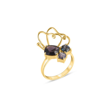 LUMINUS WINGS RING with purple spinel stones in 18k gold setting.