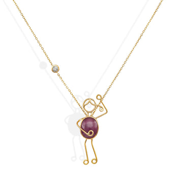 Handmade 18k gold necklace with vibrant ruby and diamond, symbolizing love and passion.
