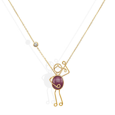 Handmade 18k gold necklace with vibrant ruby and diamond, symbolizing love and passion.