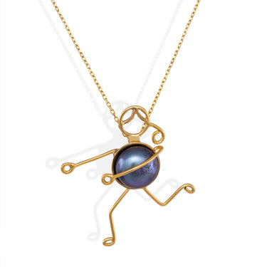 Handmade 18k gold necklace featuring a unique character design and a Tahitian pearl.