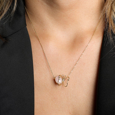 LUMINUS WINGS NECKLACE featuring rose quartz and diamond butterfly pendant on 18k gold chain.