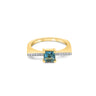 GEOMUSE RING with princess cut blue topaz and diamonds in 18k gold.