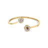 DESERT ROSE BANGLE with sapphires and diamonds in 18K gold.
