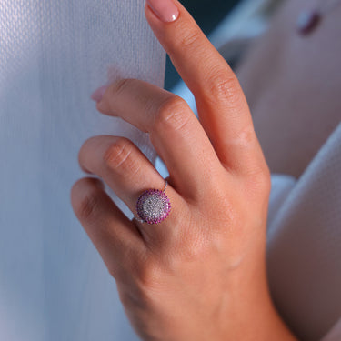 GEOMUSE RING with pink sapphires and diamonds on hand.