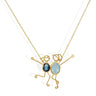 Handmade 18k gold necklace featuring blue topaz and spinel, symbolizing clarity and protection by DEMI & RUMER.