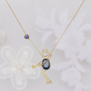 Handmade 18k gold necklace with blue sapphire centerpiece.