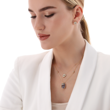 DESERT ROSE PENDANT with light pink sapphire, diamonds, and 18K gold.
