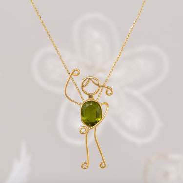 Handmade 18k gold necklace with peridot centerpiece, symbolizing renewal and growth.
