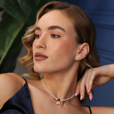 DESERT ROSE CHOKER with star ruby, diamonds, and pearl necklace in 18K gold.