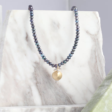 Pomegranate pendant Tahiti pearl necklace with diamonds and 18K gold.