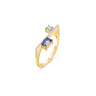 18k gold GEOMUSE ring with baguette cut tanzanite and diamonds.